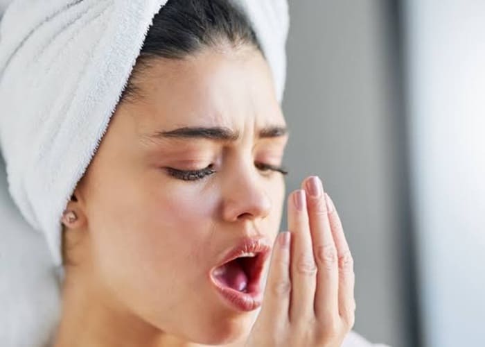 a woman feeling Bad Breath